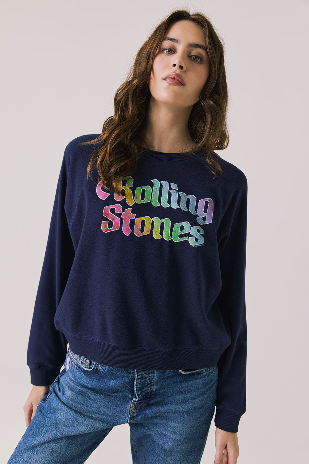 Front view of woman wearing Chaser’s The Rolling Stones US Tour 1978 Long Sleeve in Oxford Blue with tongue logo graphic on a white background