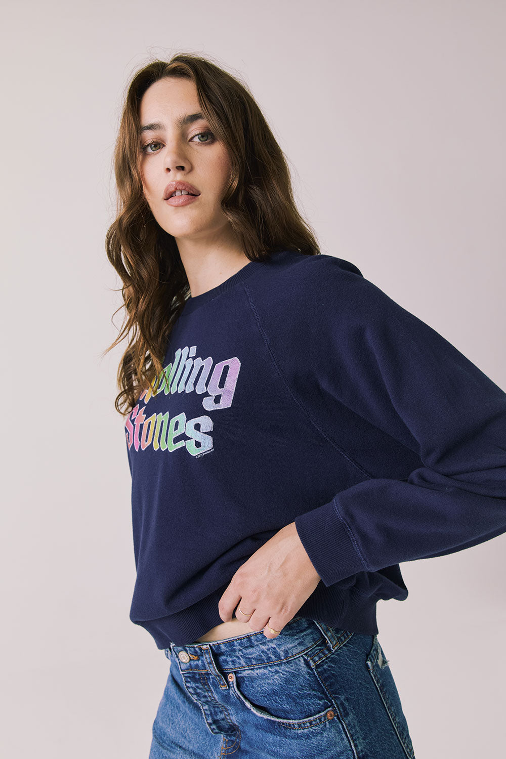 Side view of woman wearing Chaser’s The Rolling Stones US Tour 1978 Long Sleeve in Oxford Blue on a white background