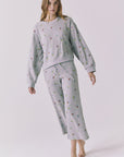 Full body view of the Chaser Brandy Heather Grey Ditsy Embroidery Crop Joggers styled with the matching Terra Pullover for an effortless coordinated lounge look