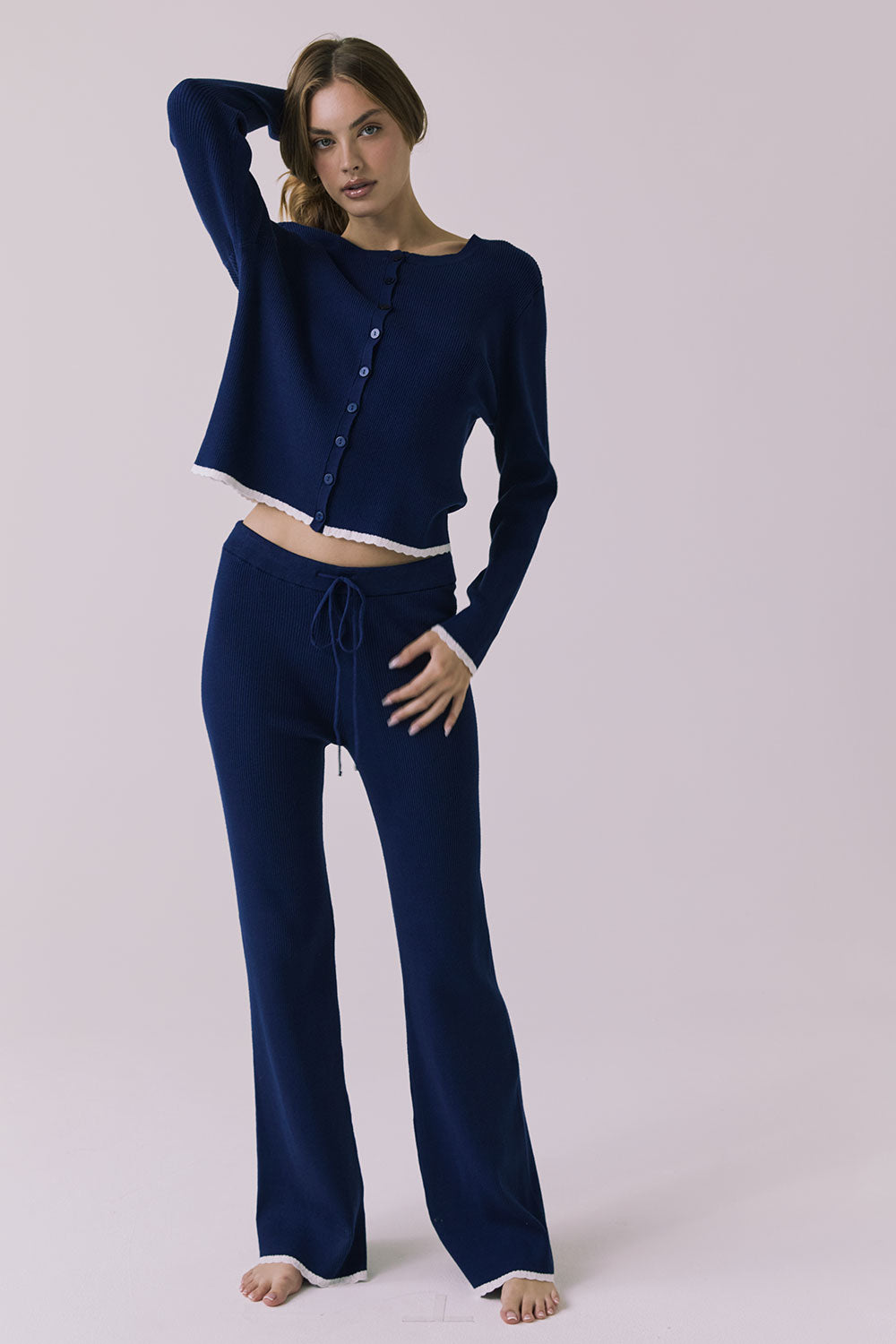 Full body front view of the Sailor Worn Blue Joggers styled with the matching Rhode Worn Blue Pullover