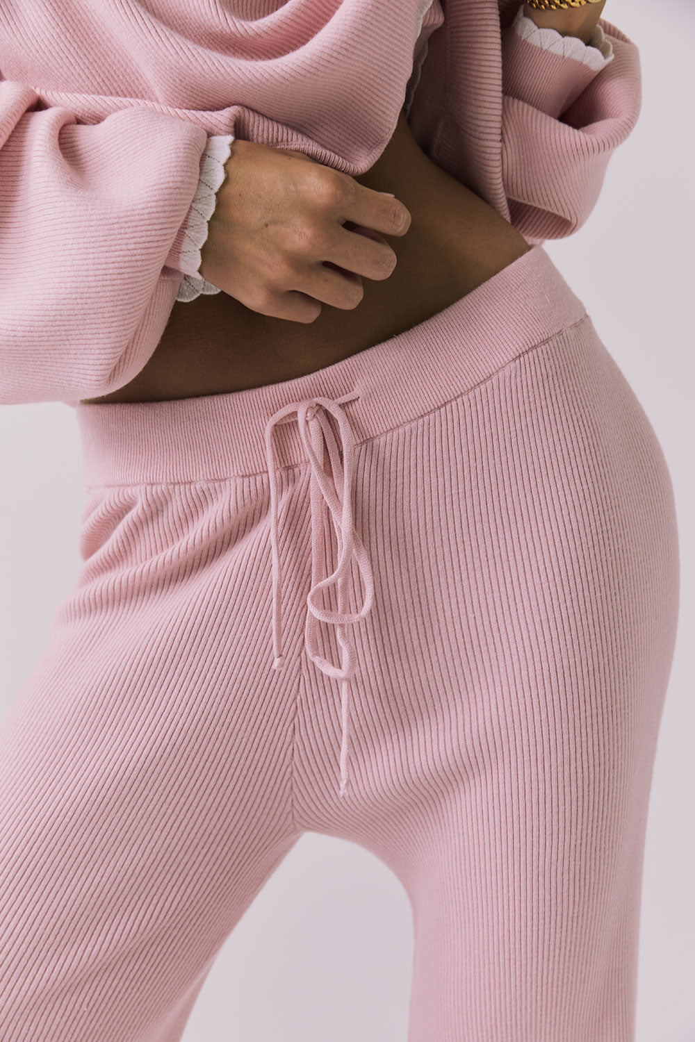 Close-up view of the Chaser Sailor Pink Salt Joggers highlighting the ribbed fabric and adjustable drawstring waistband