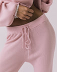 Close-up view of the Chaser Sailor Pink Salt Joggers highlighting the ribbed fabric and adjustable drawstring waistband