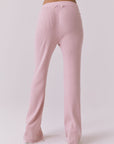 Back view of the Chaser Sailor Pink Salt Joggers in Pink Salt showing the ribbed fabric and clean back silhouette
