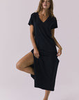 Chaser Winslet Maxi Dress in True Black featuring a relaxed v neckline short sleeves and fluid full length silhouette
