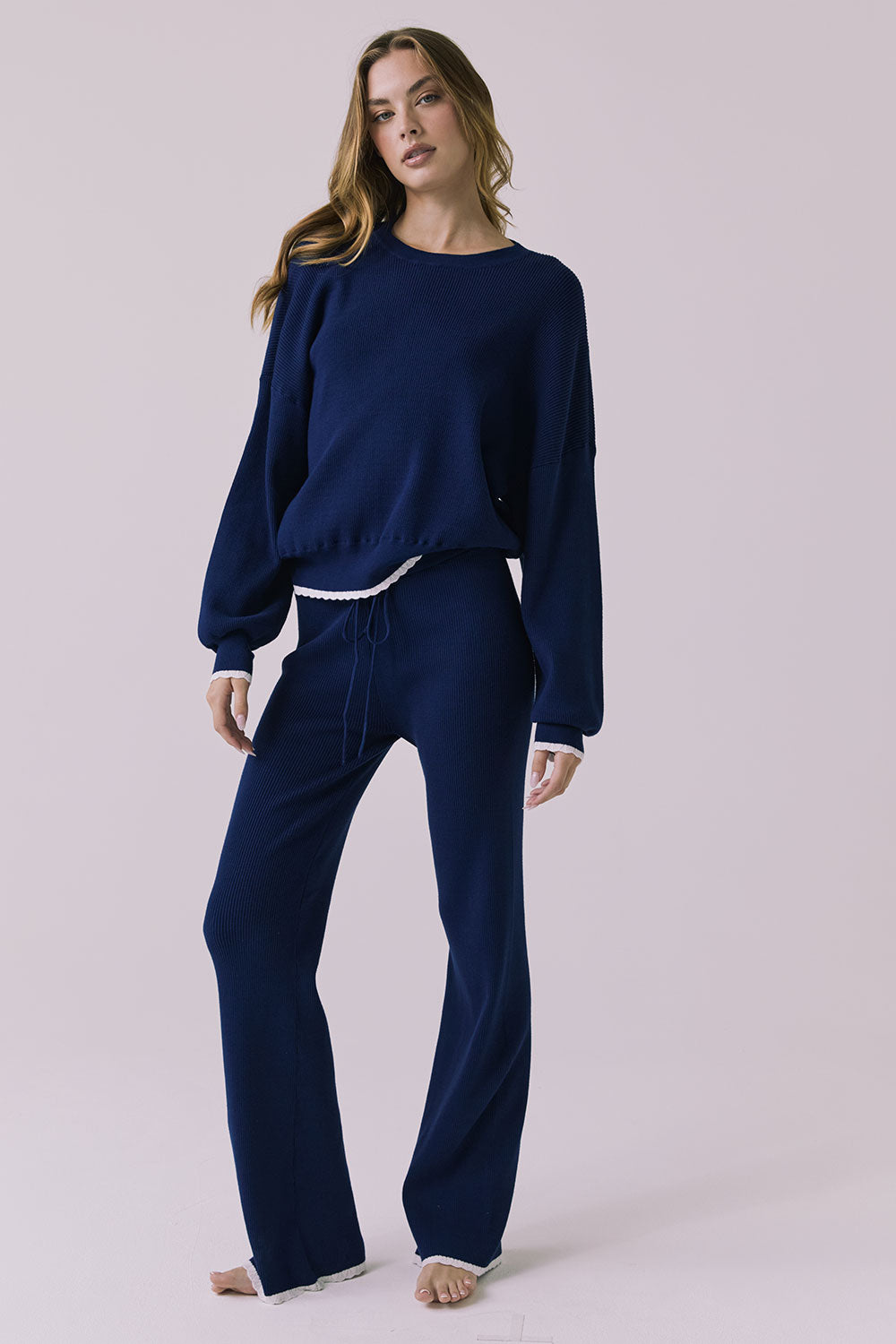Full body view of the Chaser Rhode Worn Blue Pullover styled with the matching Sailor Joggers, showing a relaxed ribbed fit