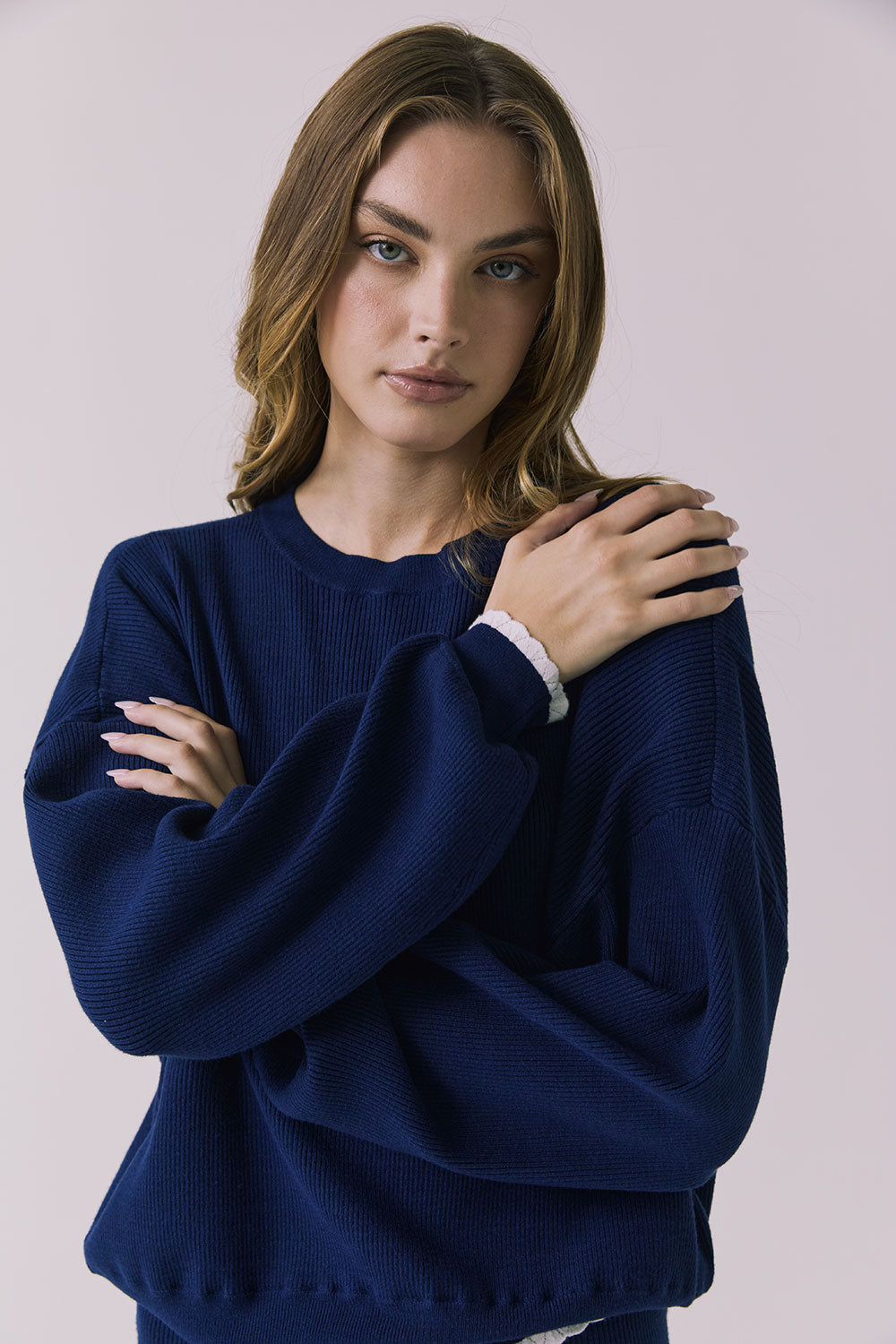 Close-up front view of the Chaser Rhode Worn Blue Pullover highlighting the ribbed fabric and crew neckline