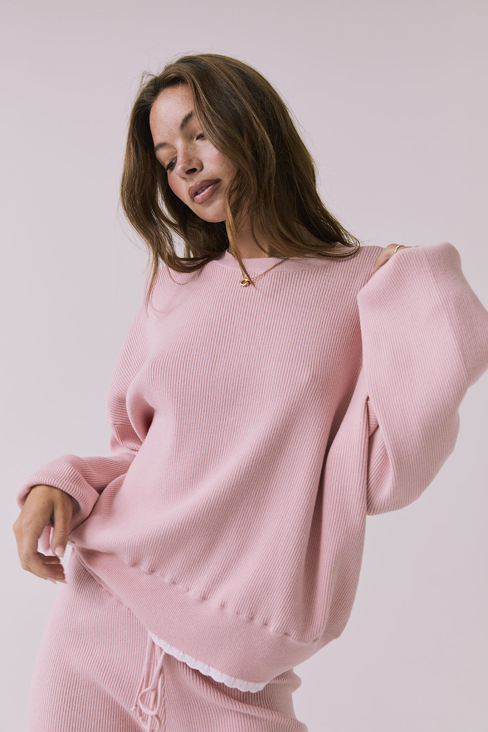 Close-up front view of the Chaser Rhode Pink Salt Pullover highlighting the soft ribbed fabric and crew neckline