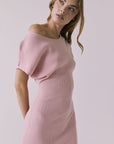 Close-up view of the Chaser Porter Midi Dress in Pink Salt highlighting the ribbed knit texture and neckline detail