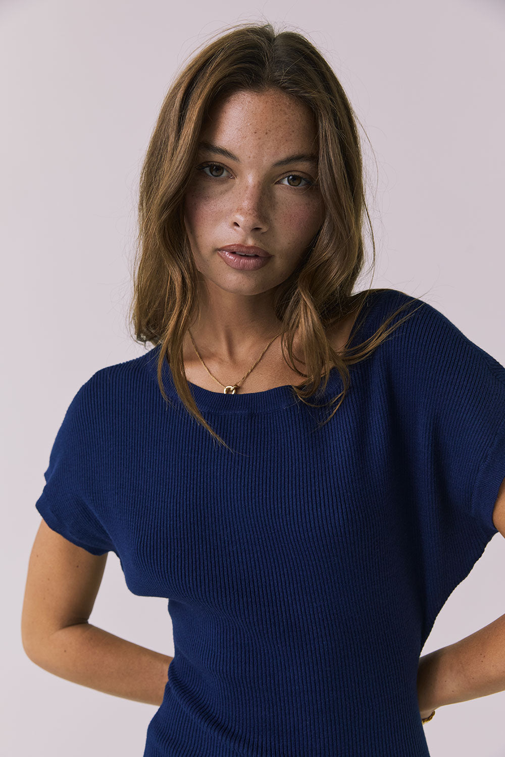 Close-up front view of the Chaser Porter Midi Dress in Worn Blue highlighting the ribbed knit fabric and neckline detail