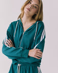 Chaser Abilenee Teal Zip Up with White Stripes in a soft front portrait shot highlighting the hood and stripe details