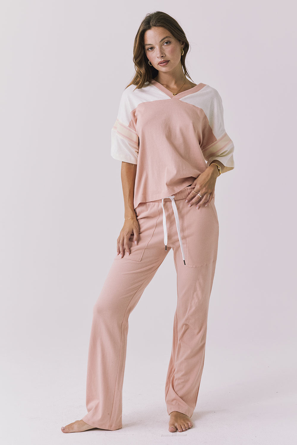 Chaser Palmer Tee in Starry White and Delicate Honey shown full body styled with matching joggers highlighting the coordinated set look and relaxed everyday fit