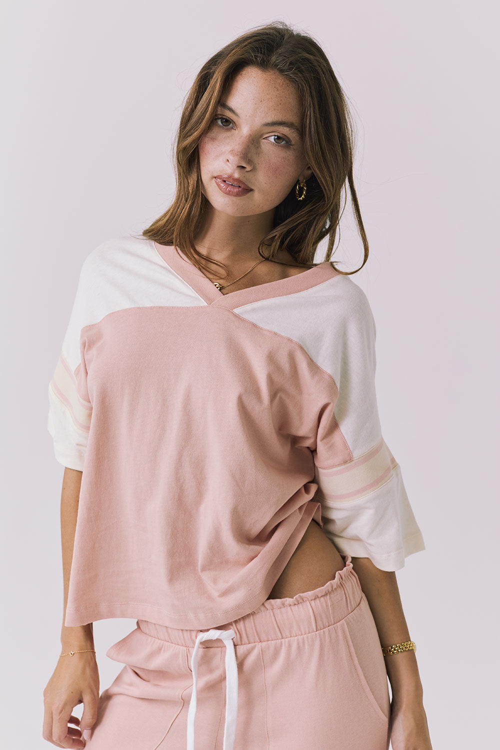 Chaser Palmer Tee in Starry White and Delicate Honey shown angled front view with subtle volume through the sleeve and laid back silhouette