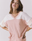 Chaser Palmer Tee in Starry White and Delicate Honey shown front with hands on hips emphasizing the relaxed fit and elastic waist detail