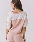 Chaser Palmer Tee in Starry White and Delicate Honey shown straight back view featuring the clean colorblock design and soft structured neckline
