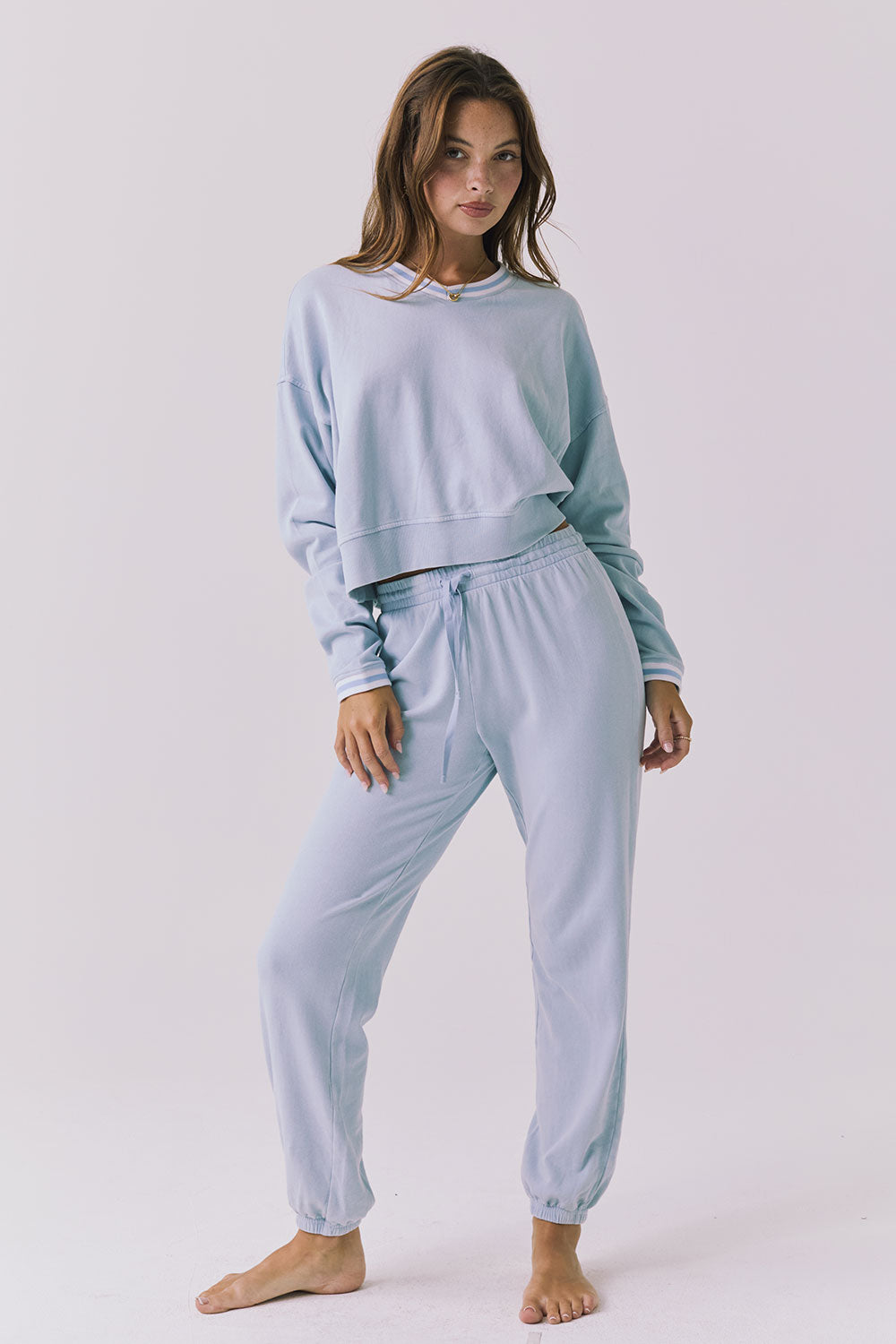 Chaser Campbell Bluebird Pullover styled full body with matching Willa Joggers in Bluebird for a coordinated lounge set look