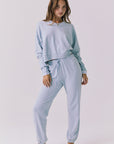 Chaser Campbell Bluebird Pullover styled full body with matching Willa Joggers in Bluebird for a coordinated lounge set look