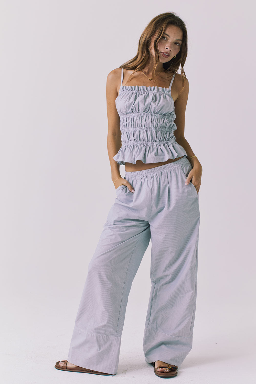Chaser Lorenzo Pinstripe Poplin Top styled with coordinating Dorit Trousers for an effortless matching set look