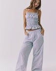 Chaser Lorenzo Pinstripe Poplin Top styled with coordinating Dorit Trousers for an effortless matching set look