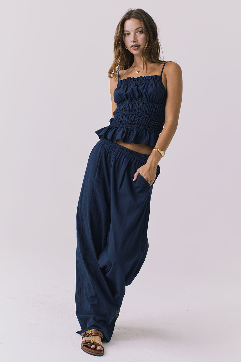 Chaser Dorit Trousers in Navy shown full body styled with the Lorenzo Tank and flat sandals for an effortless warm weather look