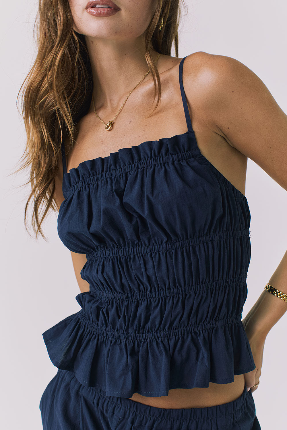 Chaser Lorenzo Navy Poplin Top in Navy highlighting gathered smocking and lightweight poplin texture