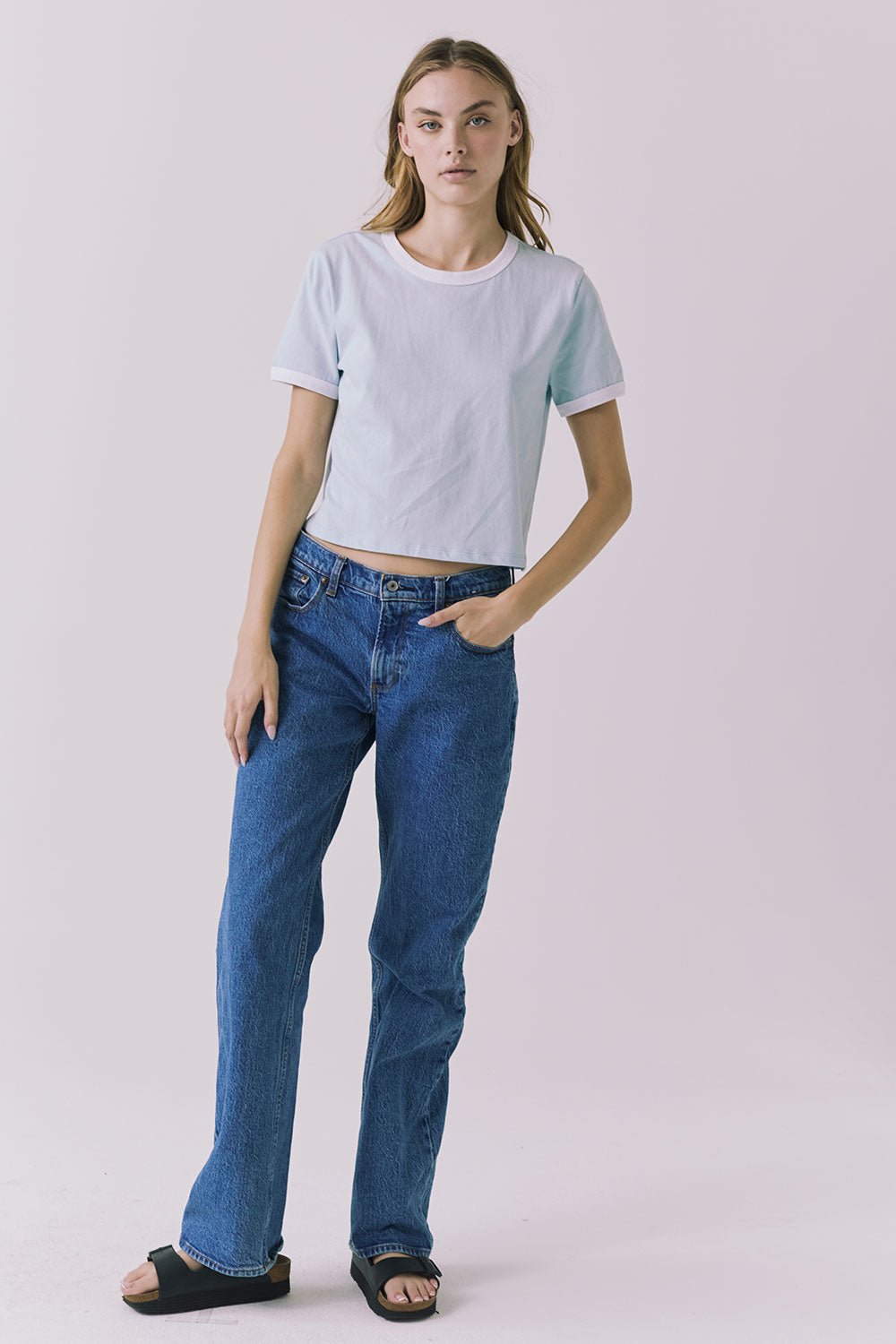 Chaser Jamesonn Tee in White and Mineral Butter shown full body styled with classic denim for an effortless everyday look