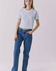 Chaser Jamesonn Tee in White and Mineral Butter shown full body styled with classic denim for an effortless everyday look