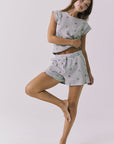 Chaser Kesh Short in Heather Grey with ditsy embroidery styled as a matching set with the Frankee Tee showcasing the coordinated waffle texture and easy lounge fit