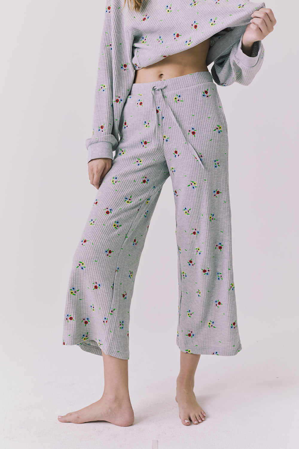 Chaser Brandy Heather Grey Ditsy Embroidery Crop Joggers shown from the front with a relaxed cropped leg and soft waffle knit texture