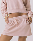 Chaser Soleil Honey Peach Mini Skort featuring a soft elastic waistband and relaxed lounge silhouette in Honey Peach