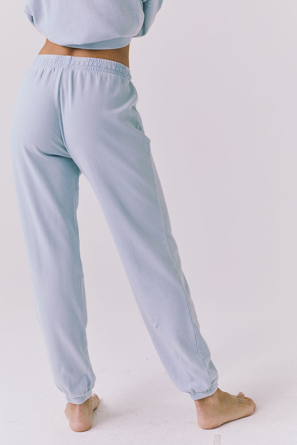 Chaser Willa Blue Bird Joggers back waist-down view in Blue Bird with soft drape and elastic ankle cuffs