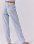 Chaser Willa Blue Bird Joggers back waist-down view in Blue Bird with soft drape and elastic ankle cuffs