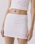 Chaser Rue White Skort in White featuring a smooth ruched waistband and soft stretch fabrication