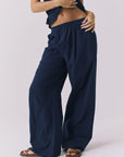 Chaser Dorit Trousers in Navy shown from the front featuring a relaxed wide leg silhouette and elastic waistband 