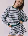 Front view of the Chaser Resort Stripe Long Sleeve Top in Heather Grey featuring horizontal stripe detailing and ribbed trim