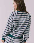 Back view of the Chaser Resort Stripe Long Sleeve Top in Heather Grey showing the striped back and ribbed hem