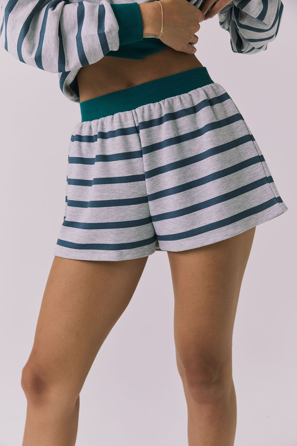Front view of the Chaser Resort Stripe Shorts in Heather Grey featuring horizontal stripe detailing and elastic waistband