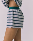 Side view of the Chaser Resort Stripe Shorts in Heather Grey showing the relaxed fit and stripe pattern