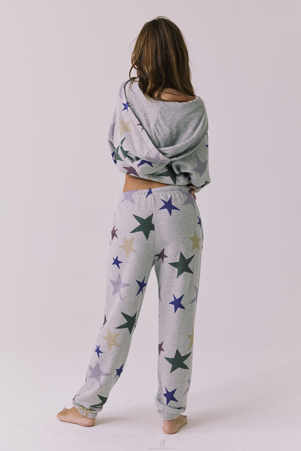 Full body back view of the Chaser You’re A Star Pants in Heather Grey styled with the matching You’re A Star Zip Up Hoodie for a coordinated lounge set