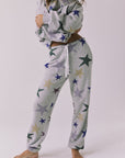 Chaser You’re A Star Pants in Heather Grey featuring an allover star print elastic waistband and relaxed jogger fit