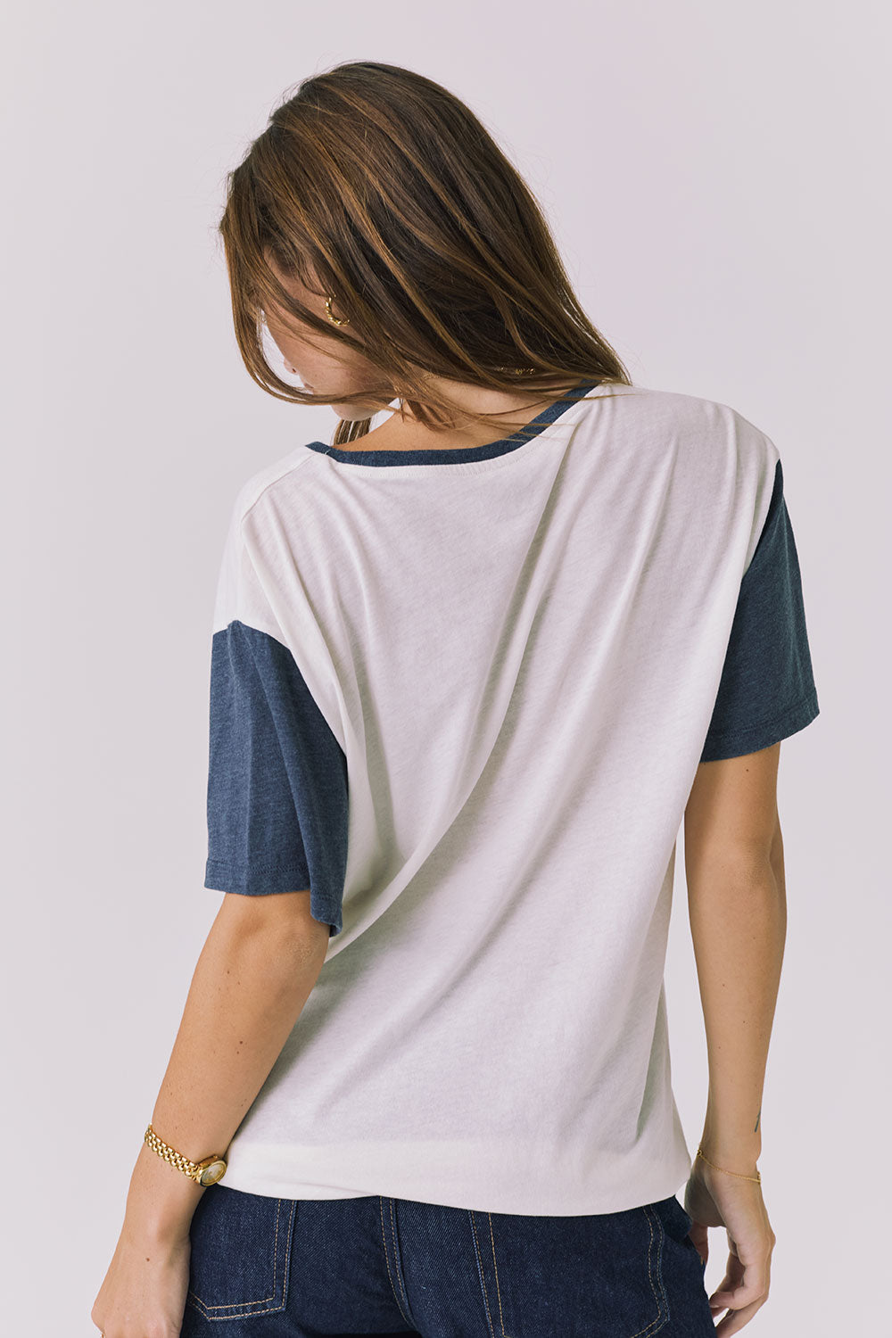 Chaser Howdy Tee in Starry White and Navy shown from the back with contrast navy sleeves and an easy slightly oversized silhouette