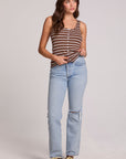 A full body front view of a woman wearing the Chaser Velora Nutty Brown Stripe Tank and jeans on a neutral background 