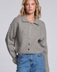 Model wearing Chaser's Winter Heather Grey Fortune Cardigan in Winter Heather Grey cropped button-front knit with pointed collar, front view