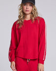 Model wearing Chaser's Cherry Bomb Anastasia Long Sleeve with contrast sleeve stripes, front view