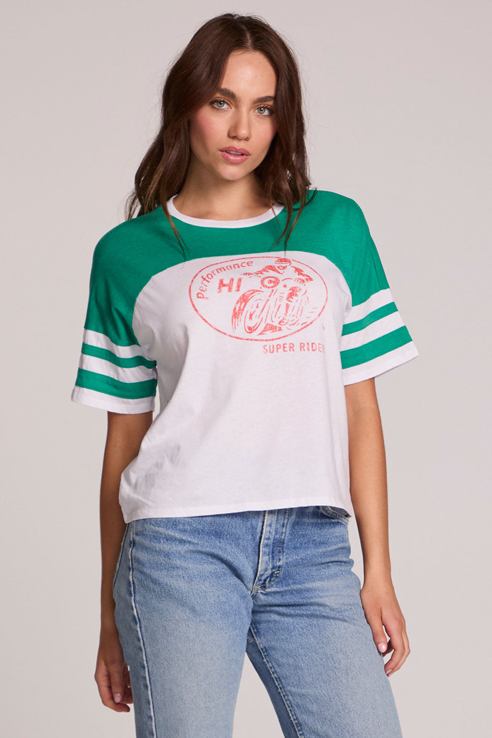 Front view of a woman wearing the Chaser  Biker Rider Graphic Tee on a neutral background