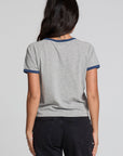 Back view of a woman wearing the Chaser California Dreamin Tee and pants on a neutral background