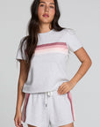 Front view of a woman wearing the Chaser  Isla Light Heather Grey Tee on a neutral background