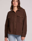 Front view of a woman wearing the Chaser Jaxxon Wood Brown Shacket on a neutral background