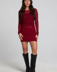 A full body front view of a woman wearing the Chaser Kevin Deep Berry Longsleeve on a neutral background