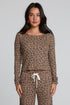 Front view of a woman wearing the Chaser  Klara Leopard Button Down Top on a neutral background