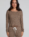 Front view of a woman wearing the Chaser  Klara Leopard Button Down Top on a neutral background